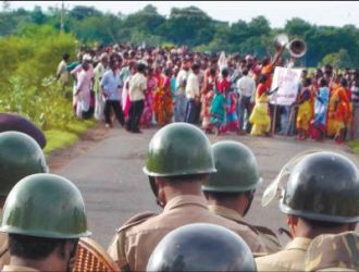 policemen-stop-a-rally-of-the-peoples-committee-against-police-atrocities-at-lalgarh-on-august-26